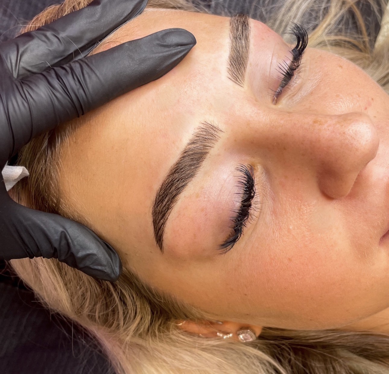 Freshly shaped and tinted brows, close up
