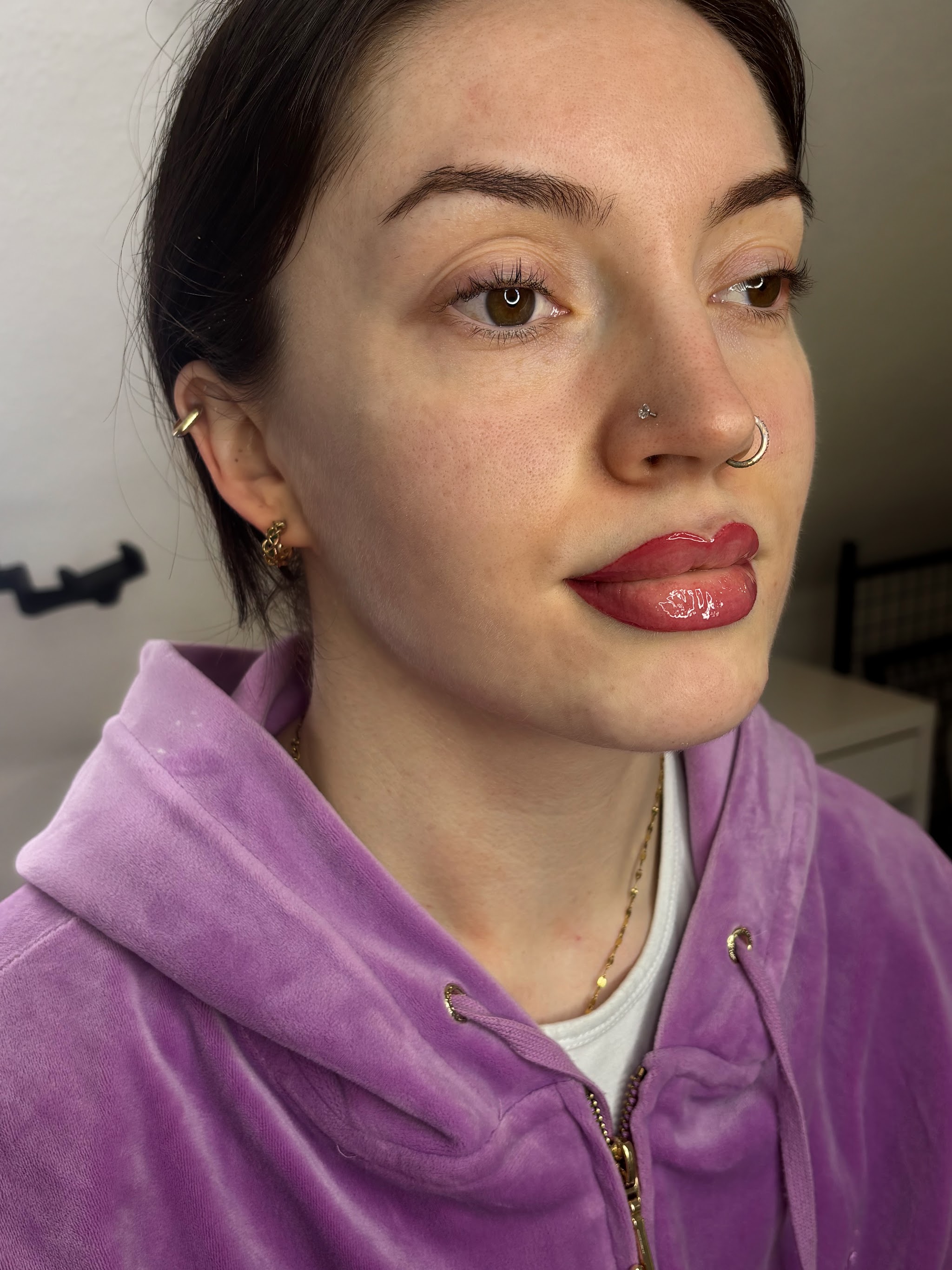 A client's lips and brows after treatment